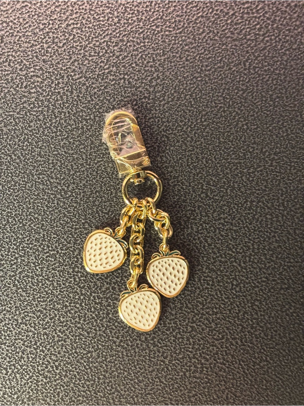 Gold-tone Keychain with White Strawberry Charms